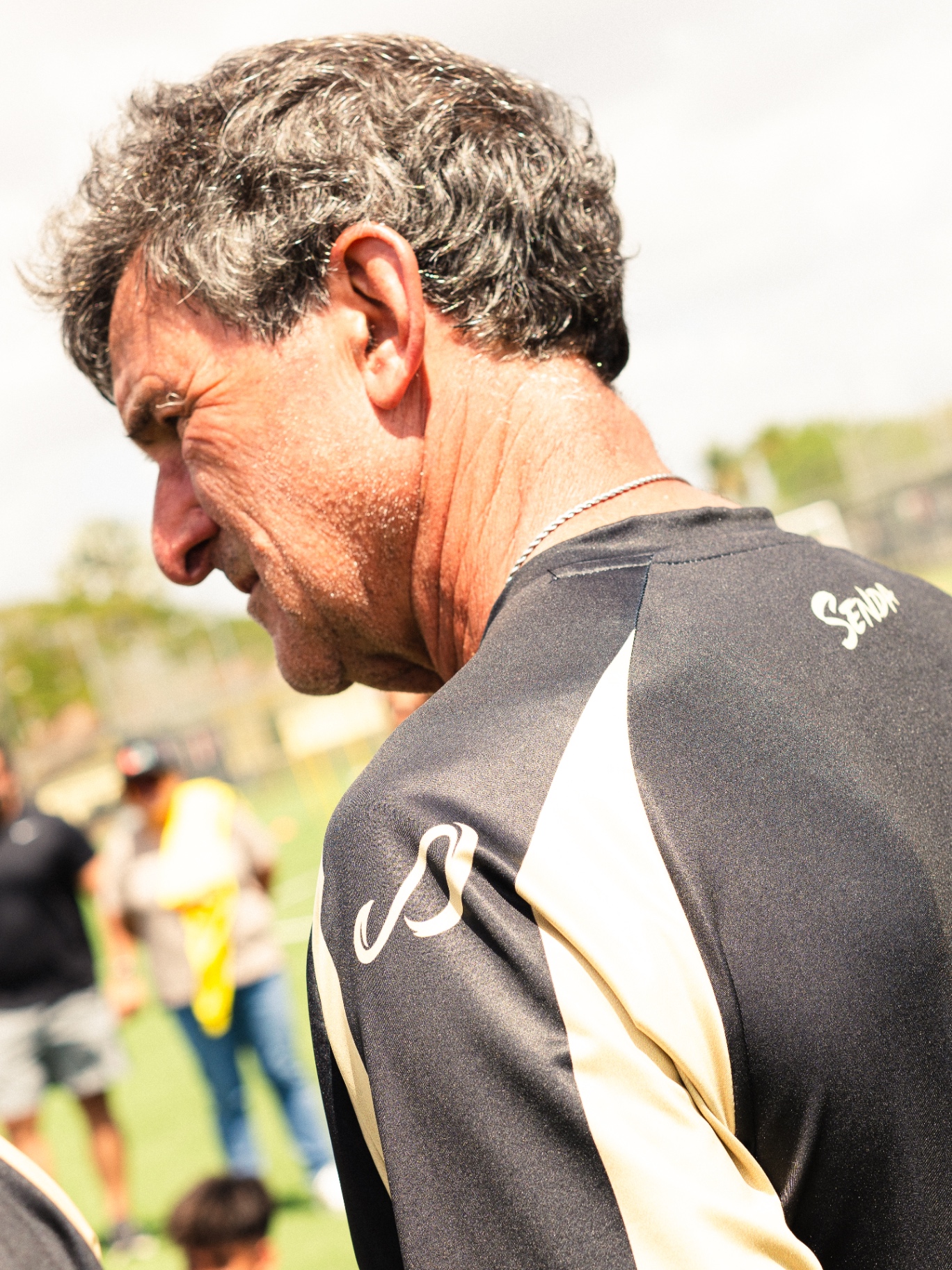 Mario Kempes on the sideline during a camp session